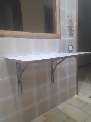 Mesa plegable pared de comedor