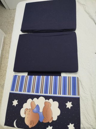 Colchón para cuna azul con ositos