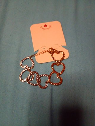 Pulsera con eslabones de corazones en dos colores