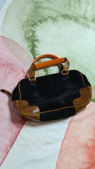 Bolso de mano negro y marrón