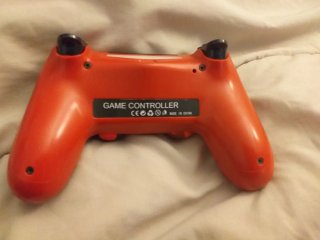 Mando PS4 Camuflaje Naranja