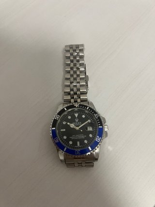 Reloj azul y negro Mas info md