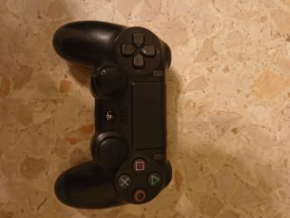 PS4 Pro 1TB + Mando Sony + soporte