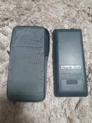 Calculadora HP 48G con funda y manual