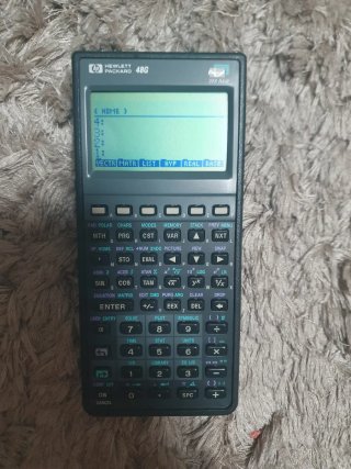Calculadora HP 48G con funda y manual