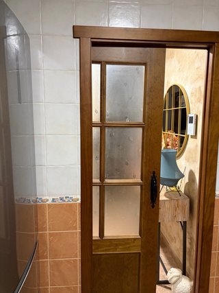 Puerta madera maciza nogal corredera