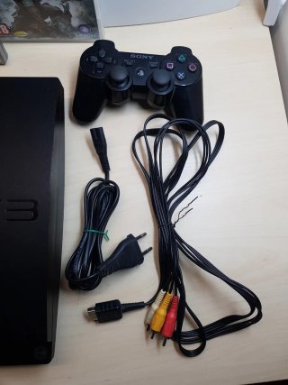 Consola PlayStation 3 (PS3) con juegos y cables