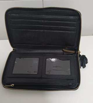 Cartera de mano acolchada negra