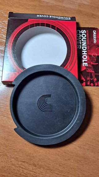 Cubierta D'Addario para orificio de guitarra.