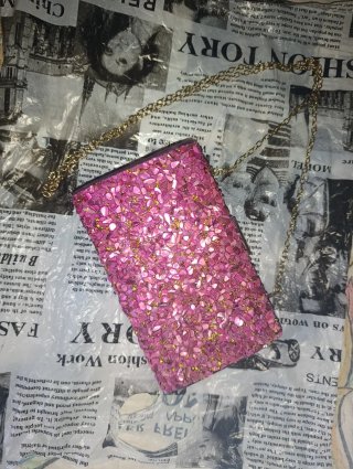 Bolso de fiesta rosa y dorado