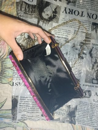 Bolso de fiesta rosa y dorado
