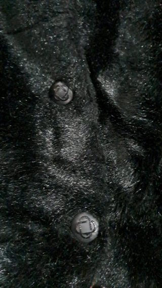Abrigo de piel negro