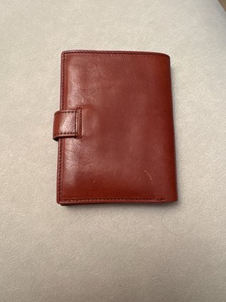 Cartera de mano de cuero genuino