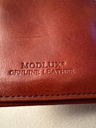 Cartera de mano de cuero genuino