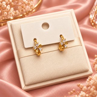 Pendientes de acero, dorados con flores blancas
