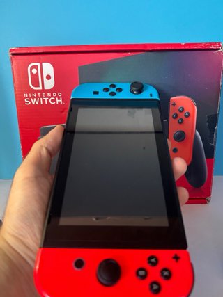 Nintendo Switch V2 con caja, accesorios + juego