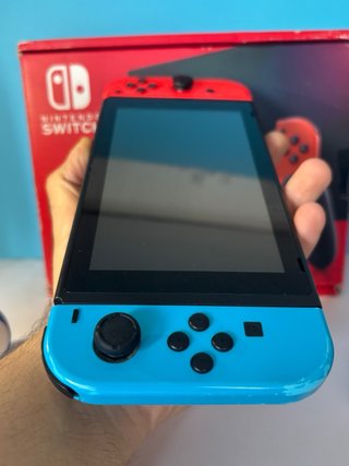 Nintendo Switch V2 con caja, accesorios + juego