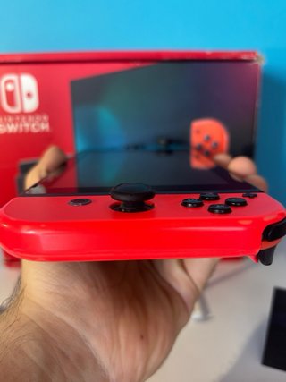 Nintendo Switch V2 con caja, accesorios + juego