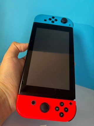 Nintendo Switch V1 + funda y control pro