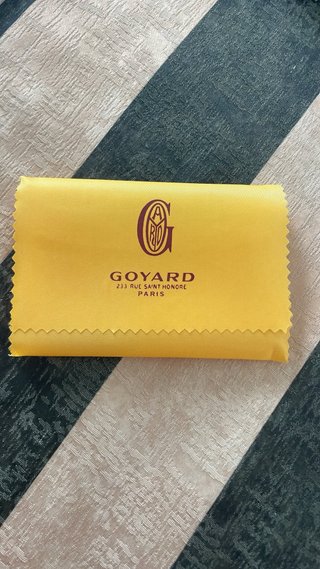 Cartera Goyard azul y multicolor