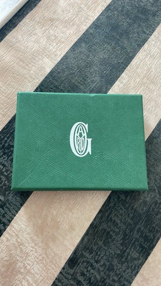 Cartera Goyard azul y multicolor
