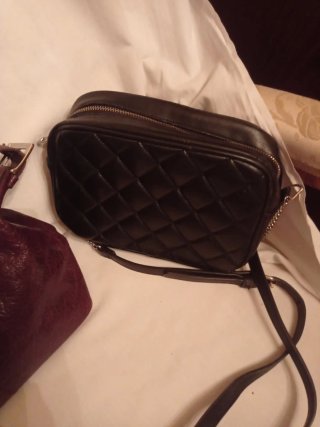 Bolsos vintage cuero marron y negro de Stradivariu