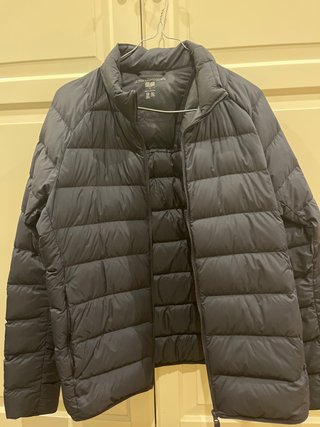 Plumas Ultra Light Uniqlo Talla S, azul marino