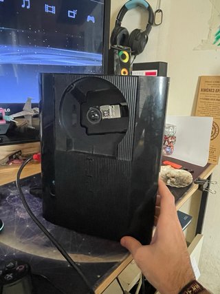 PS3 Super Slim 500GB + Mando + 2 Juegos