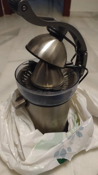 Exprimidor de naranjas eléctrico