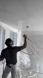 Pintor con Pistola Airless