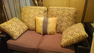 Conjunto de sofás de tela y piel