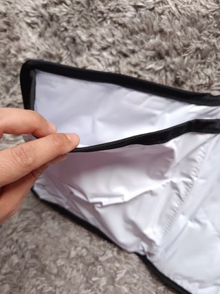 Cambiador portátil y juguetes para bebé