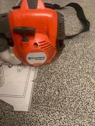 Podadora de altura Husqvarna