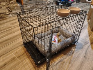 Jaula plegable para perros con cama