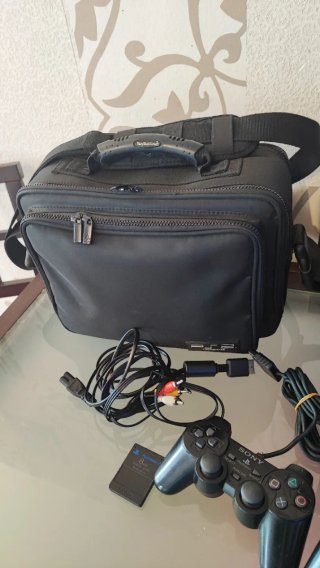 Consola PS2 con maletín y mandos