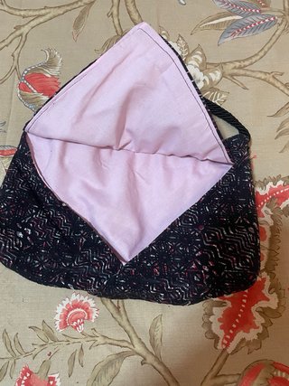 Bolso de mano tipo bombonera