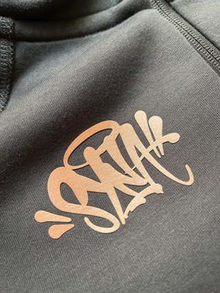 Conjunto Nike Tech Fleece Syna World