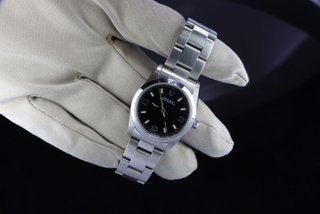 Rolex Oyster Perpetual 67480 31mm Negro