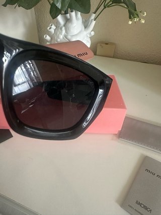 Gafas Miu Miu Negras y Doradas