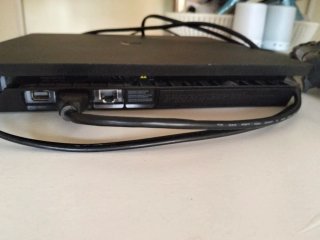 Consola Sony PlayStation 4 (PS4) Negra y mando.