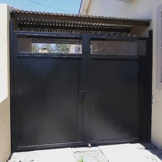 Puerta batiente de acero chapa lisa - desde 399€