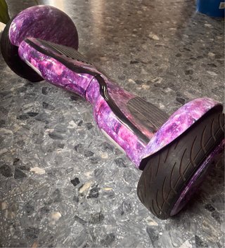 Patinete eléctrico galaxia morado
