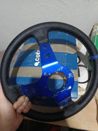 Volante OMP desplazado azul