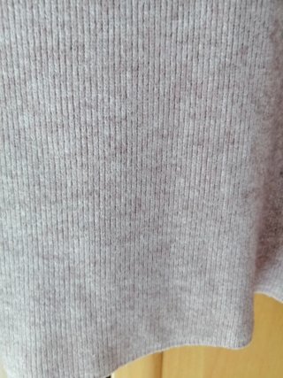 Jersey de punto color rosa palo.