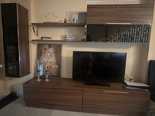 Mueble TV salón con vitrina
