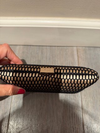 Bolso de mano Purificación García negro y dorado