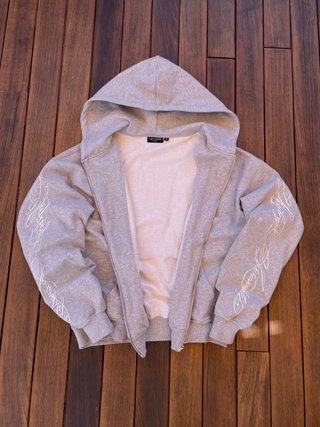 Sudadera con cremallera gris de alta calidad