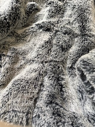 Chaqueta Zara pelo sintético gris con capucha