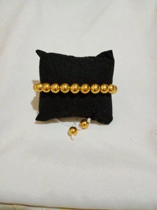 Pulsera de Cuentas Doradas