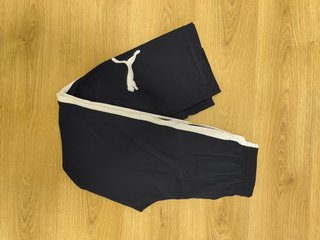 Calças desportivas Puma azul marinho e branco